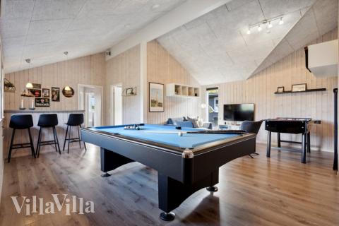 Neben den vielen schönen Stunden, die man im Poolbereich des Hauses verbringen kann, bietet das Luxusferienhaus 371 auch Spielevergnügen bei Billard/Tischtennis und Darts
