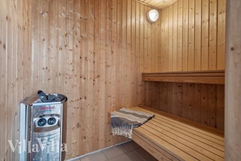 Genießen Sie die heiße Sauna im Luxusferienhaus Nr. 371 für 21 Personen