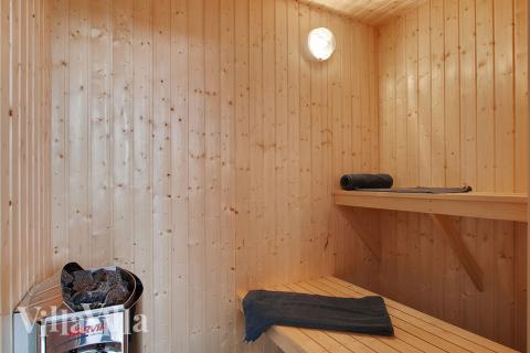 Genießen Sie die heiße Sauna im Luxusferienhaus Nr. 372 für 18 Personen