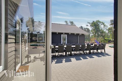 Genießen Sie einen Grillabend auf der Terrasse des Luxusferienhauses Nr. 374 in Bornholm