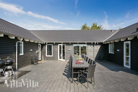 Das Luxusferienhaus Nr. 376 hat eine tolle Terrasse, die mit hochwertigen Gartenmöbeln für 22 Personen ausgestattet ist.
