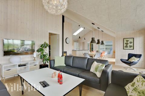 Aufenthaltsraum mit Platz für 18 im Luxusferienhaus Nr. 379.