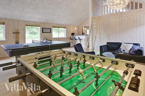 Neben den vielen schönen Stunden, die man im Poolbereich des Hauses verbringen kann, bietet das Luxusferienhaus 379 auch Spielevergnügen bei Billard/Tischtennis und Darts