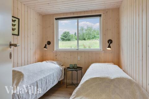 Eines der 9 Schlafzimmer im Luxusferienhaus Nr. 375