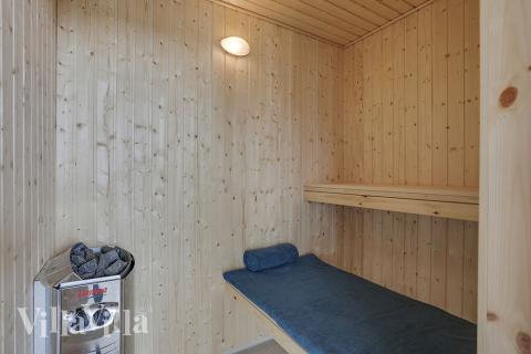 Genießen Sie die heiße Sauna im Luxusferienhaus Nr. 377 für 18 Personen