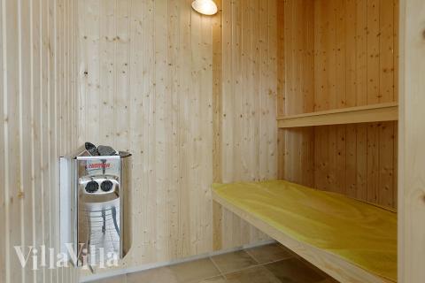 Genießen Sie die heiße Sauna im Luxusferienhaus Nr. 378 für 18 Personen