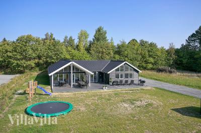 Dieses schöne Poolhaus Nr. 378 mit Platz für 18 Personen liegt in Nordseeland
