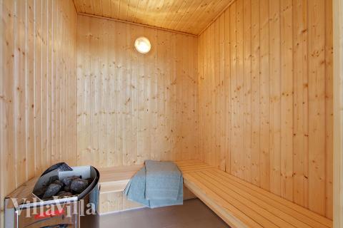 Genießen Sie die heiße Sauna im Luxusferienhaus Nr. 383 für 18 Personen