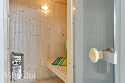 Genießen Sie die heiße Sauna im Luxusferienhaus Nr. 384 für 20 Personen