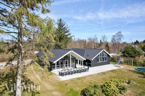 Dieses schöne Poolhaus Nr. 384 mit Platz für 20 Personen liegt in Nordseeland