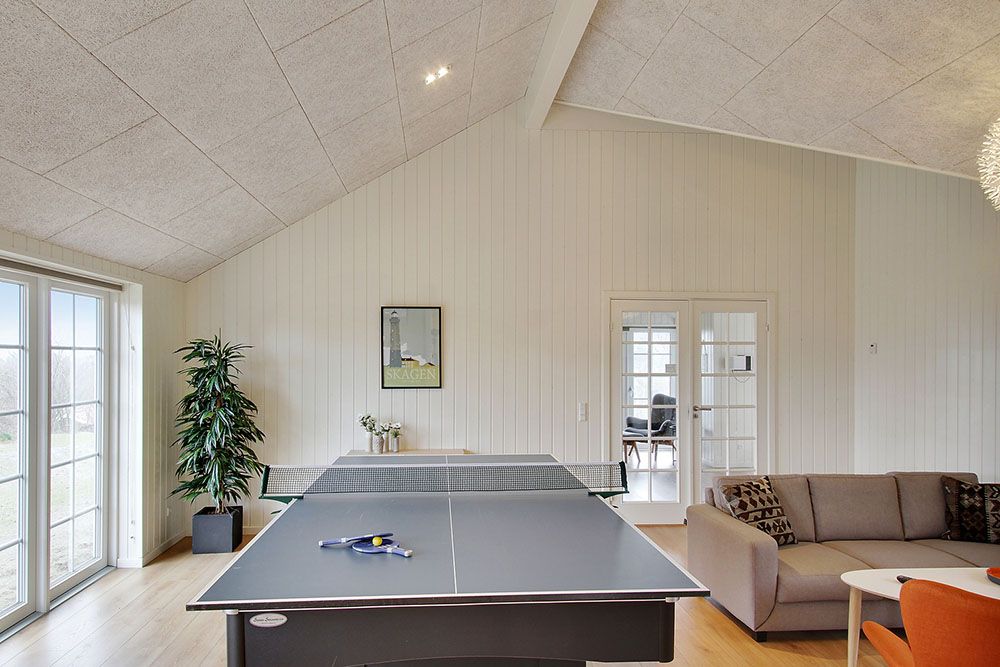 Das Luxusferienhaus 386 für 18 Personen hat einen großen Aktivitätsraum mit u. a. Billard und Darts