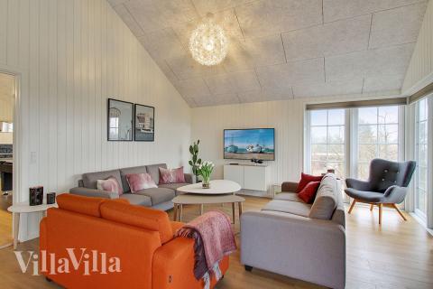 Aufenthaltsraum mit Platz für 18 im Luxusferienhaus Nr. 386.