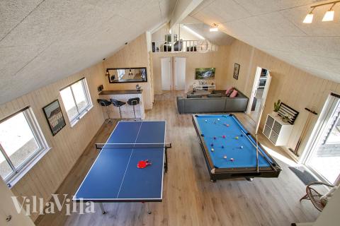 Neben den vielen schönen Stunden, die man im Poolbereich des Hauses verbringen kann, bietet das Luxusferienhaus 394 auch Spielevergnügen bei Billard/Tischtennis und Darts