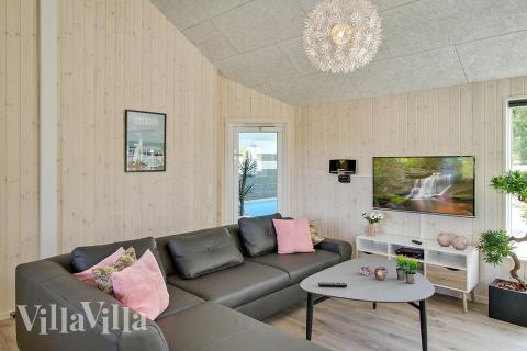 Aufenthaltsraum mit Platz für 22 im Luxusferienhaus Nr. 394.