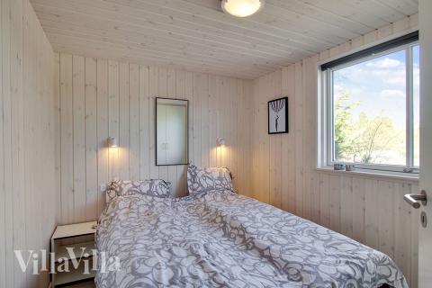 Eines der 8 Schlafzimmer im Luxusferienhaus Nr. 394