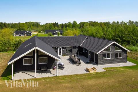 Dieses schöne Poolhaus Nr. 394 mit Platz für 22 Personen liegt in Ostjütland