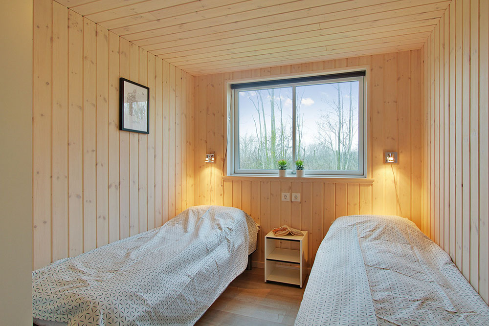 Eines der 9 Schlafzimmer im Luxusferienhaus Nr. 701