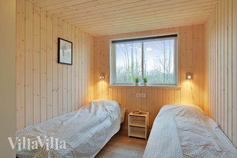 Eines der 9 Schlafzimmer im Luxusferienhaus Nr. 701