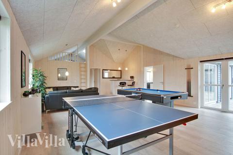 Neben den vielen schönen Stunden, die man im Poolbereich des Hauses verbringen kann, bietet das Luxusferienhaus 701 auch Spielevergnügen bei Billard/Tischtennis und Darts