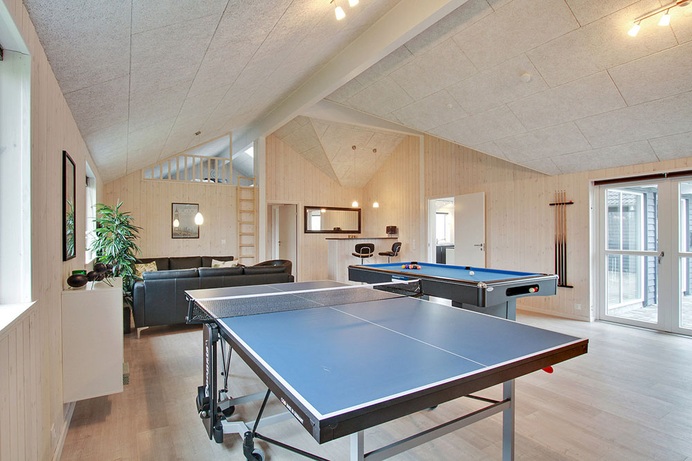 Neben den vielen schönen Stunden, die man im Poolbereich des Hauses verbringen kann, bietet das Luxusferienhaus 701 auch Spielevergnügen bei Billard/Tischtennis und Darts