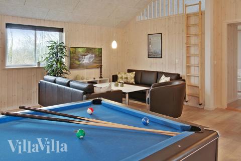 Das Luxusferienhaus 701 für 24 Personen hat einen großen Aktivitätsraum mit u. a. Billard und Darts