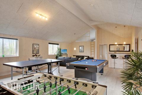 Aktivitätsraum im Luxusferienhaus Nr. 701 mit 9 Schlafzimmern und Platz für 24 Gäste.