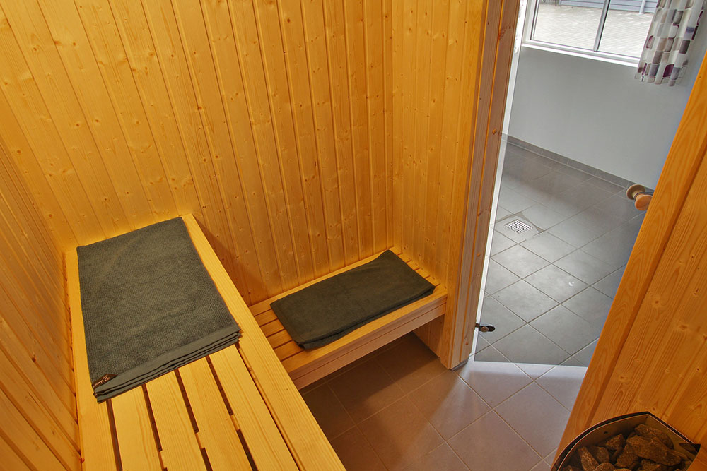 Genießen Sie die heiße Sauna im Luxusferienhaus Nr. 701 für 24 Personen