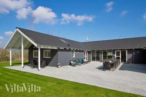 Das Luxusferienhaus Nr. 701 hat eine tolle Terrasse, die mit hochwertigen Gartenmöbeln für 24 Personen ausgestattet ist.