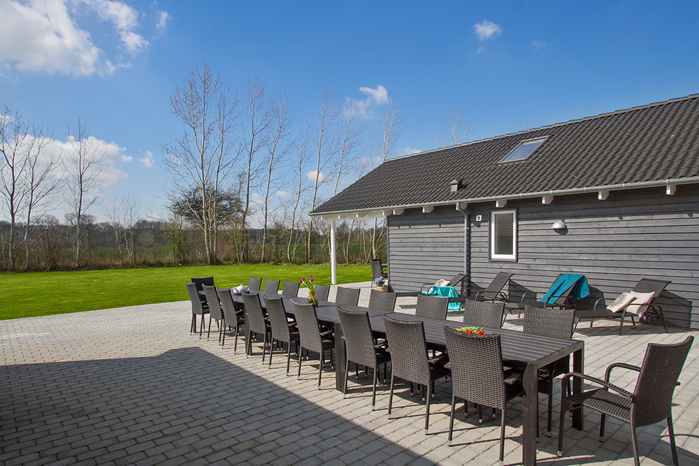 Genießen Sie einen Grillabend auf der Terrasse des Luxusferienhauses Nr. 701 in Deutschland