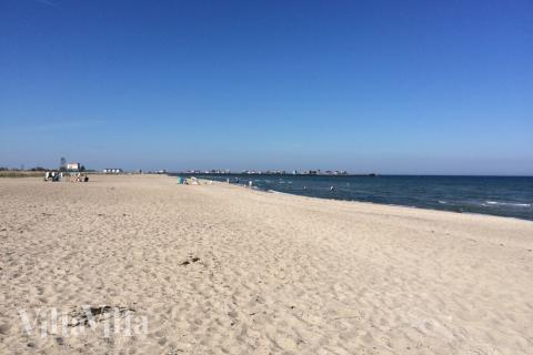 Der Strand in der Nähe von Luxusferienhaus Nr. 701 in Deutschland lädt zum Spazierengehen ein.