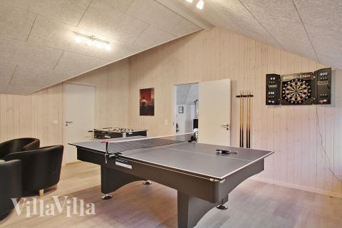 Aktivitätsraum im Luxusferienhaus Nr. 702 mit 5 Schlafzimmern und Platz für 12 Gäste.