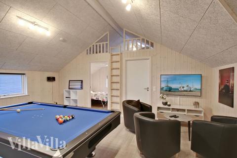 Das Luxusferienhaus 702 für 12 Personen hat einen großen Aktivitätsraum mit u. a. Billard und Darts