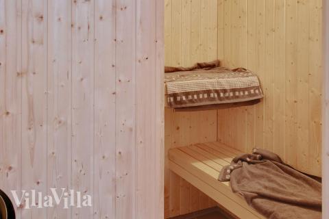 Genießen Sie die heiße Sauna im Luxusferienhaus Nr. 702 für 12 Personen