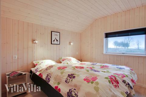 Eines der 5 Schlafzimmer im Luxusferienhaus Nr. 702