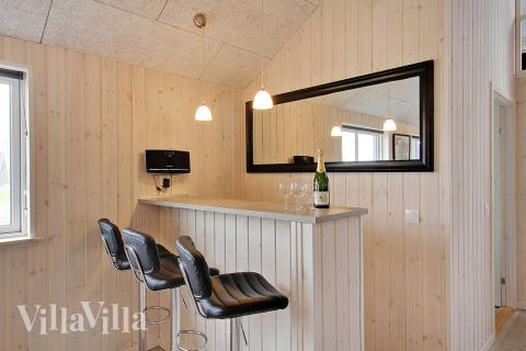 Die tollen Ferienhäuser sind unter anderem mit einer Bar ausgestattet, wie in diesem Luxusferienhaus 703 in Deutschland