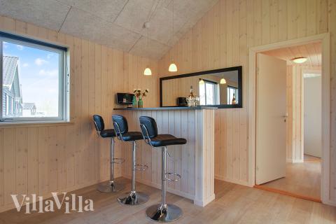 Das Ferienhaus 704 ist mit eigener Bar ausgestattet