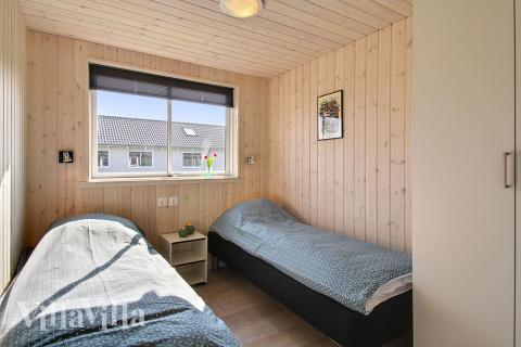 Eines der 7 Schlafzimmer im Luxusferienhaus Nr. 704