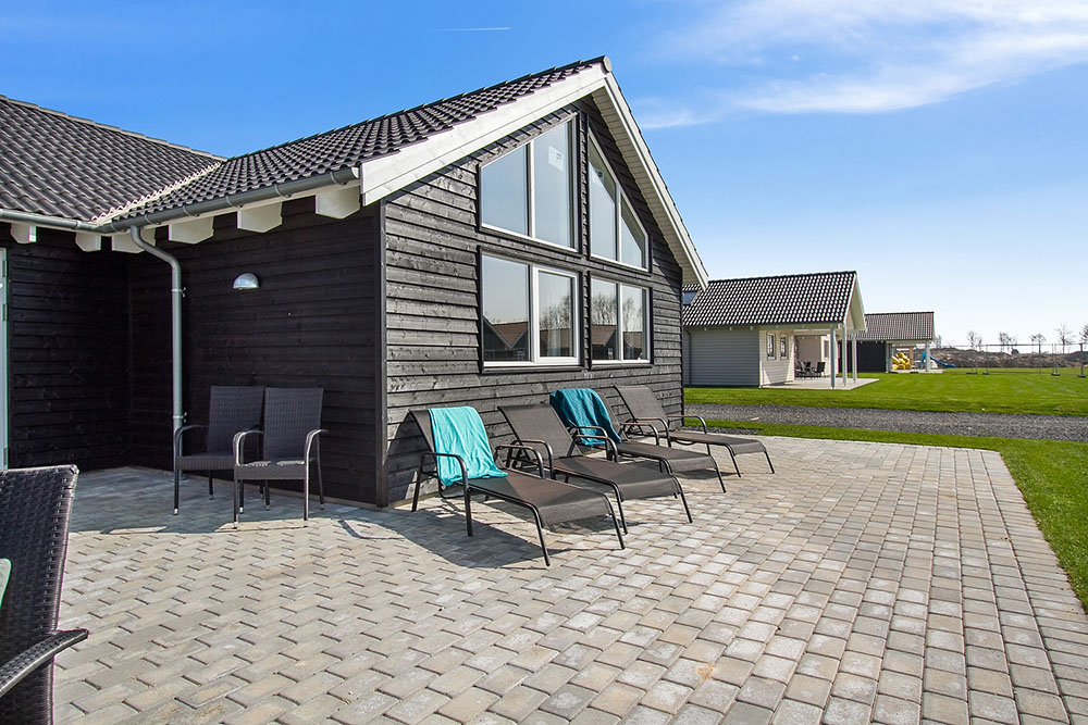 Das Luxusferienhaus Nr. 704 hat eine tolle Terrasse, die mit hochwertigen Gartenmöbeln für 18 Personen ausgestattet ist.