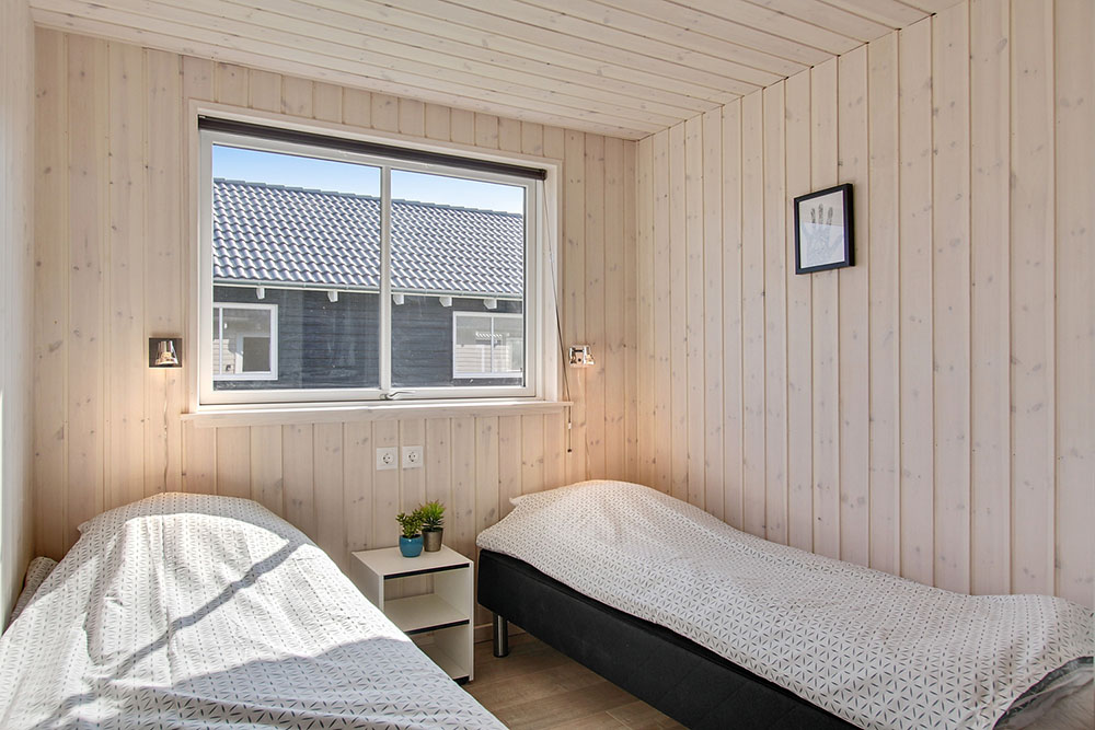 Eines der 8 Schlafzimmer im Luxusferienhaus Nr. 705