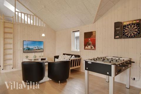 Aktivitätsraum im Luxusferienhaus Nr. 709 mit 6 Schlafzimmern und Platz für 16 Gäste.