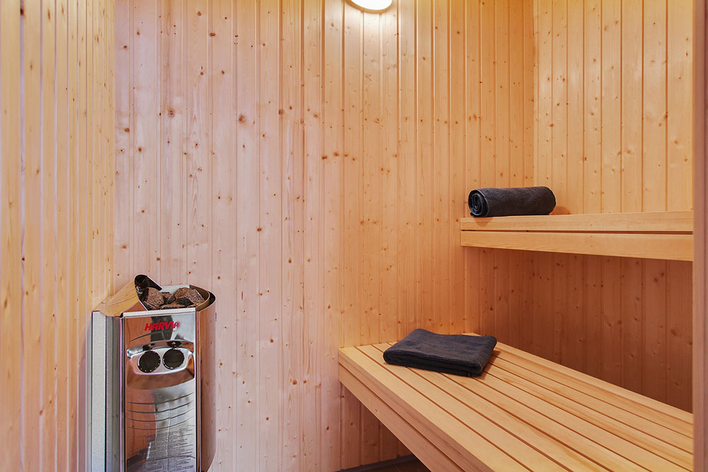 Genießen Sie die heiße Sauna im Luxusferienhaus Nr. 709 für 16 Personen