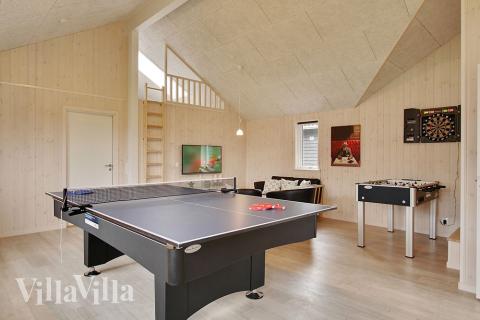 Das Luxusferienhaus 709 für 16 Personen hat einen großen Aktivitätsraum mit u. a. Billard und Darts