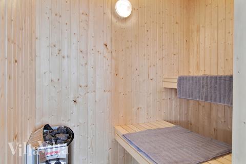 Genießen Sie die heiße Sauna im Luxusferienhaus Nr. 710 für 18 Personen