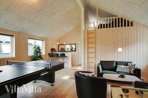 Das Luxusferienhaus 710 für 18 Personen hat einen großen Aktivitätsraum mit u. a. Billard und Darts