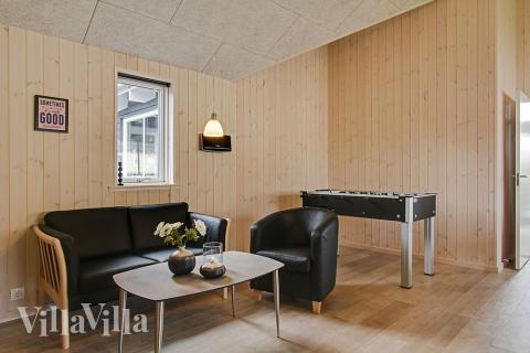 Das Luxusferienhaus 711 für 16 Personen hat einen großen Aktivitätsraum mit u. a. Billard und Darts