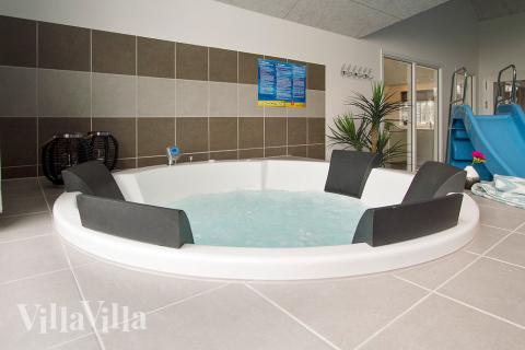 Genießen Sie den warmen Whirlpool im Luxusferienhaus Nr. 711 in Deutschland