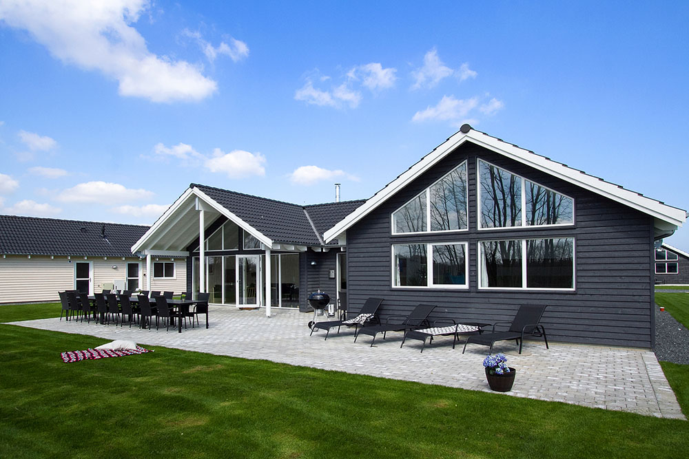 Das Luxusferienhaus Nr. 711 hat eine tolle Terrasse, die mit hochwertigen Gartenmöbeln für 16 Personen ausgestattet ist.