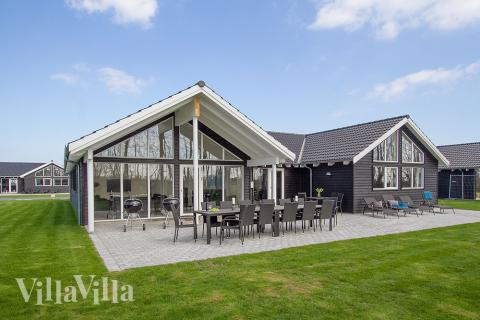 Genießen Sie einen Grillabend auf der Terrasse des Luxusferienhauses Nr. 712 in Deutschland