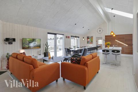 Der Aufenthaltsraum bietet Platz für 20 Personen, wenn ihr das Ferienhaus 393 in Westjütland besucht.