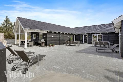 Dieses schöne Poolhaus Nr. 393 mit Platz für 20 Personen liegt in Westjütland